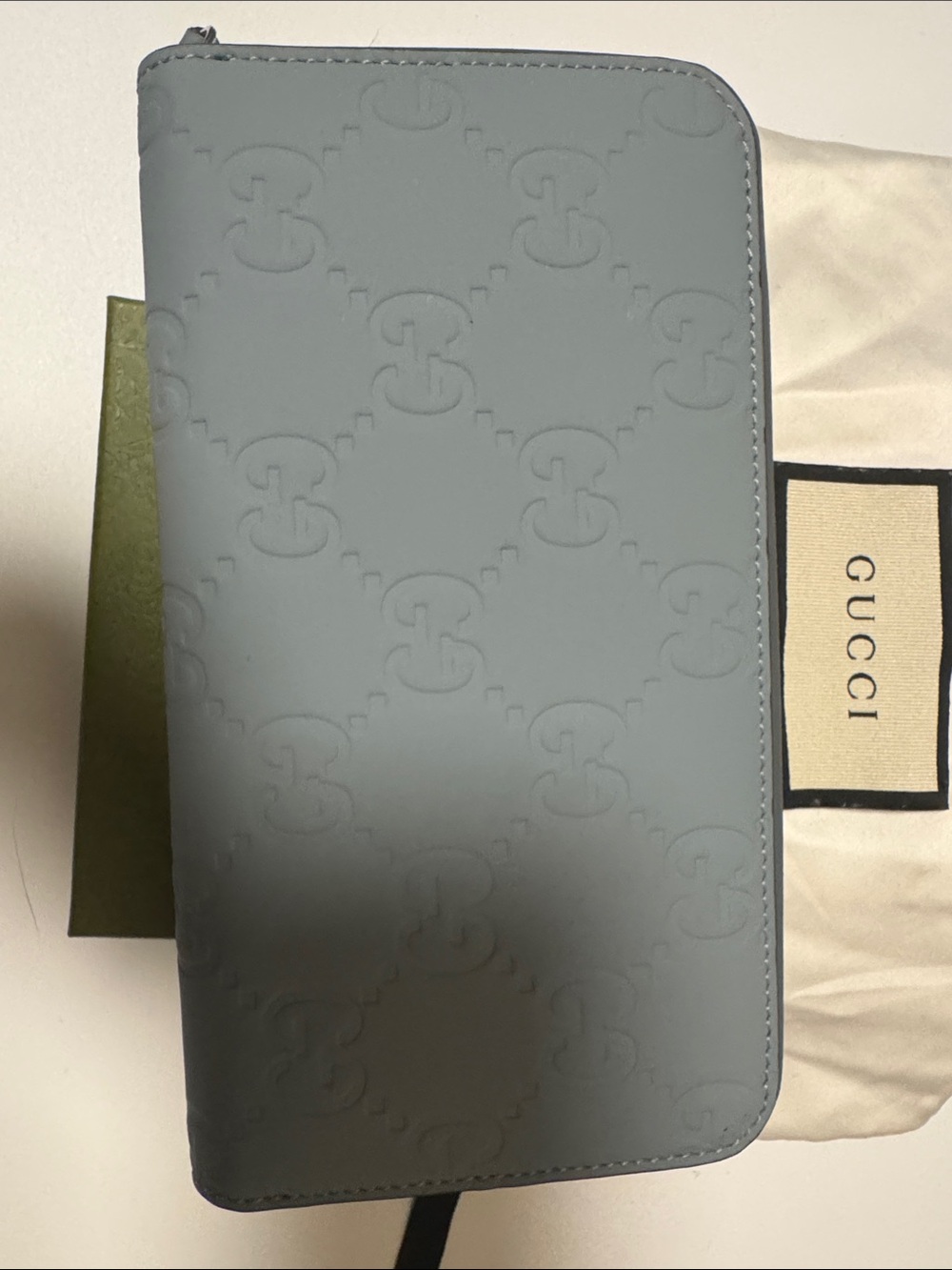 Gucci Light Blue Embossed GG Zip-Around Wallet
